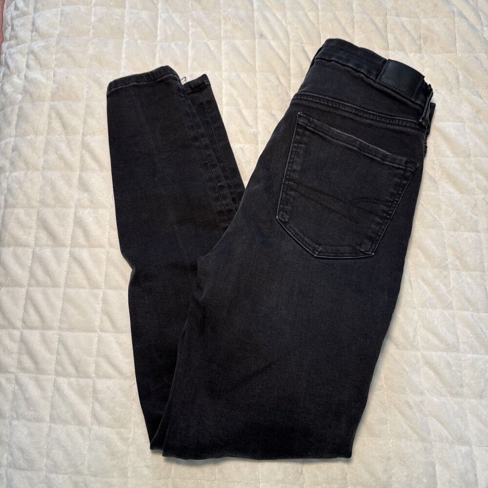 American Eagle Black Jeggings with knee distressing Size 6